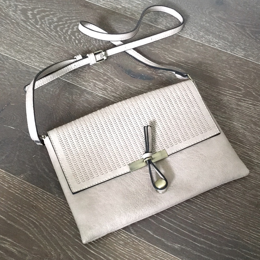 Crossbody bag purse taupe color. Magnetic and loop closure. Excellent condition
